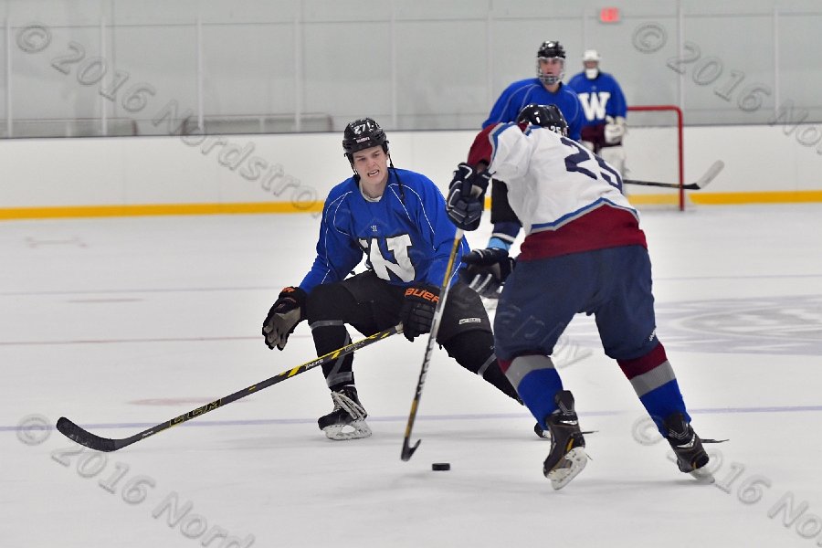 Wheaton College Men\'s Ice Hockey vs Middlesex Community College. - Photo By: KEITH NORDSTROM
